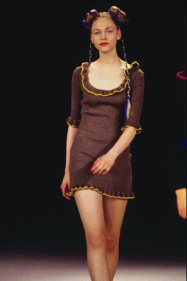 Knitted dress with a light brown finish