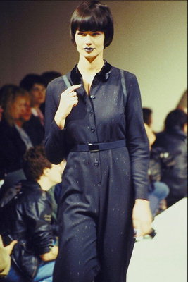 The dress of linen in dark blue on a button