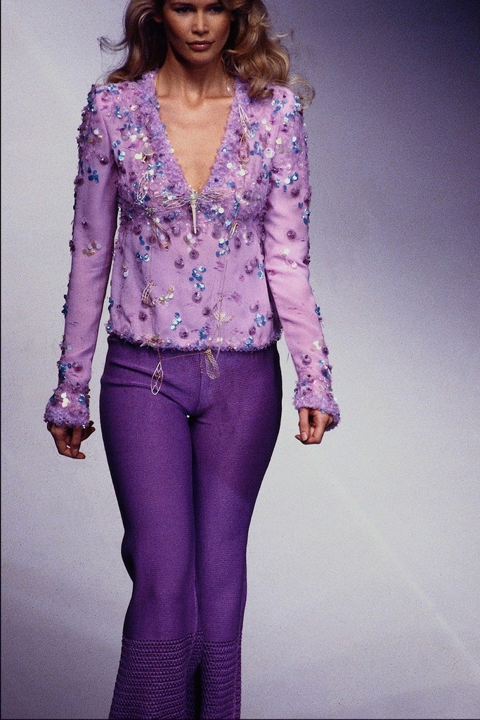夹克贴花的珠子。 紫裤子