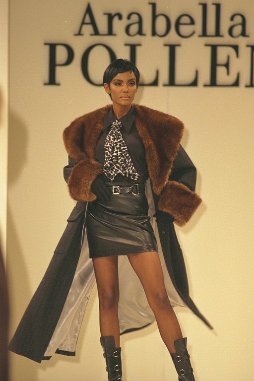 Leather coat with fur collar and cuffs