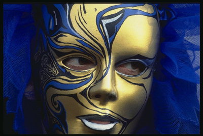 Mask of gold with figures in dark blue and light blue tone