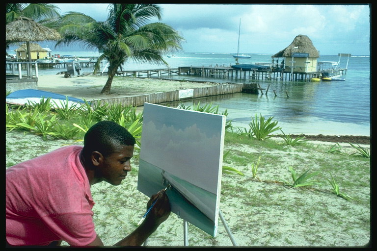 Човек рисува картината на реката банка