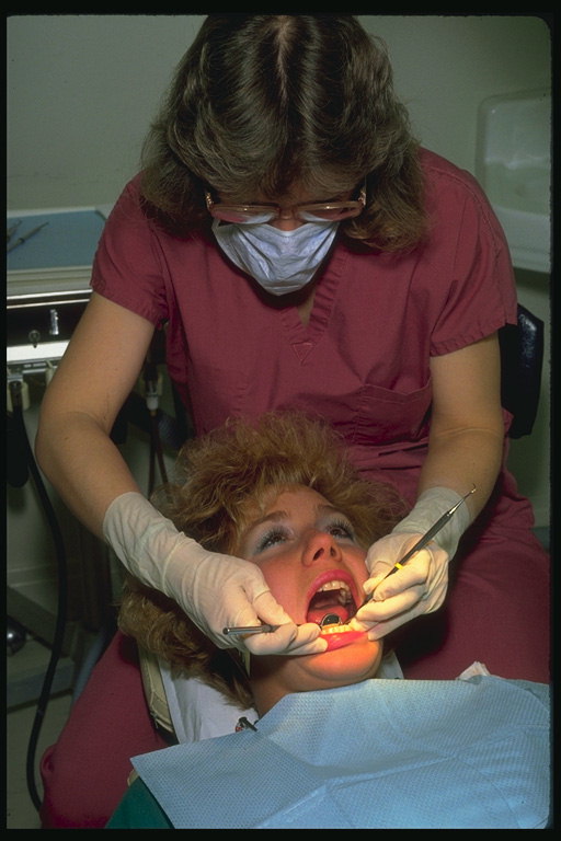 歯医者。 患者の観察