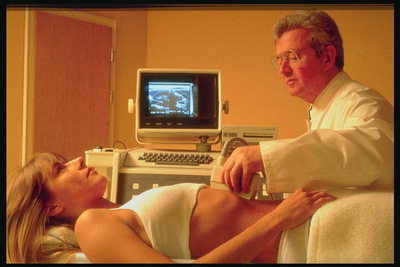 Doctor. At ultrasonography