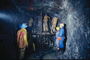 Mijnwerkers in kolenmijn
