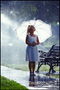Девочка в белом сарафане под белым зонтом. Летний дождь