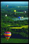 Balloon over the green forests and blue river