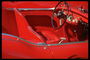 Спортивный,красный,удобный,с мягким сиденьем кабриолет - подходящая машина для деловых женщин