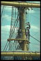 Fixing the sails on a ship engaged in professional mariners with extensive experience