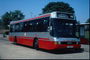 Междугородний, пассажирский ярко-красный автобус