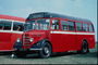 Private rød buss for en startkapital i transportbransjen