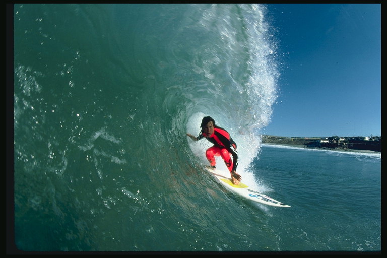 Wave surfer uses as a prop to keep the board