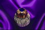 Перстень з золота з хвилями і темно-синім каменем у вигляді ромба