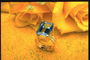 Перстень з прозорим каменем з блакитним відтінком