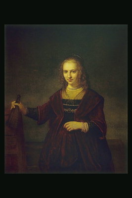 Жінка в темно-бордового бархатном плаття